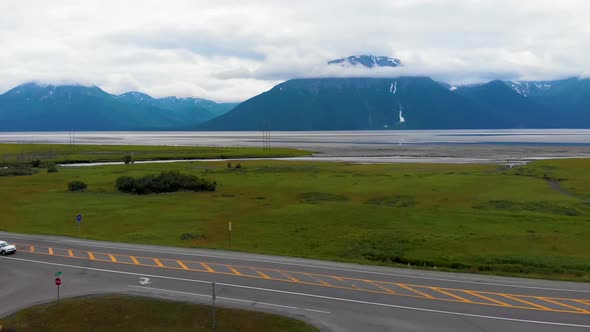 4K Drone Video of Mountains Surrounding Turnagain Arm Bay Looking Over Seward Highway Alaska Route 1