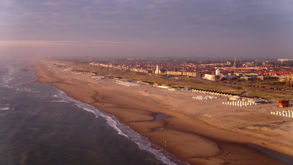 Coastal town of Katwijk aan Zee in the Netherlands at sunset. Panoramic, aerial view