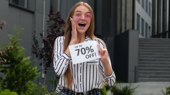 Smiling Girl Showing Up To 70 Percent Off Inscriptions Signs, Rejoicing Good Discounts, Low Prices
