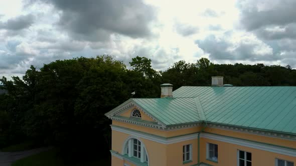 Stork on the Roof of  the Old Mezotne Castle. Aerial Dron Shot.