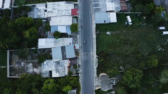 Aerial bird view of a street in Izamal City during evening, Mexico. Drone.