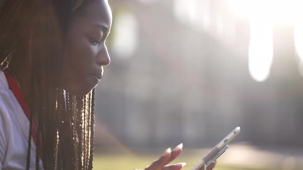 Focused Darkskinned Girl Student Studying Outdoor