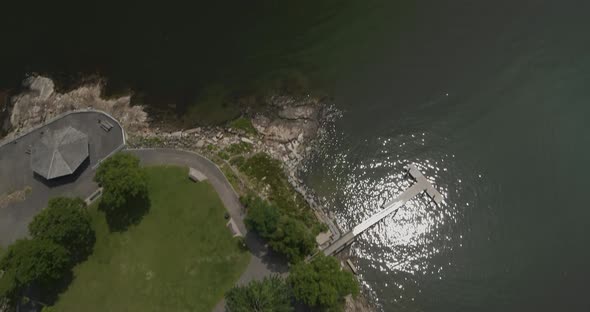 Boats Docked on a Bay Aerial Tilt Up