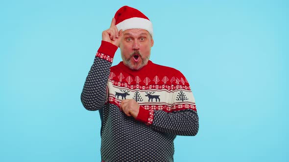 Excited Man in Christmas Sweater Make Gesture Raises Finger Came Up with Creative Plan Good Idea