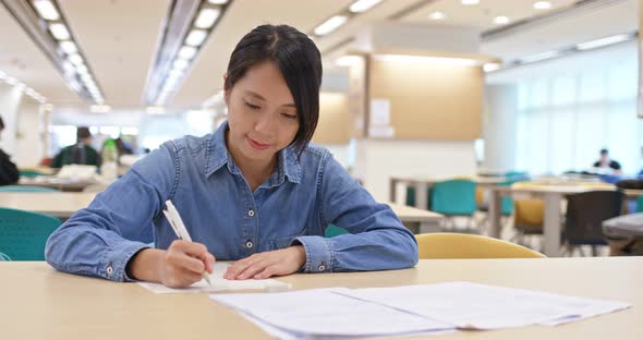 Woman study at library