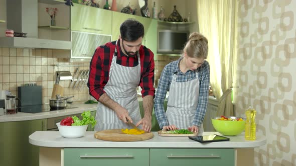 Woman and Man Cooking