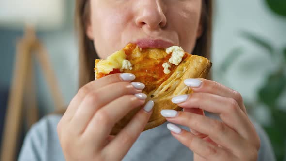 Woman Eating Pizza