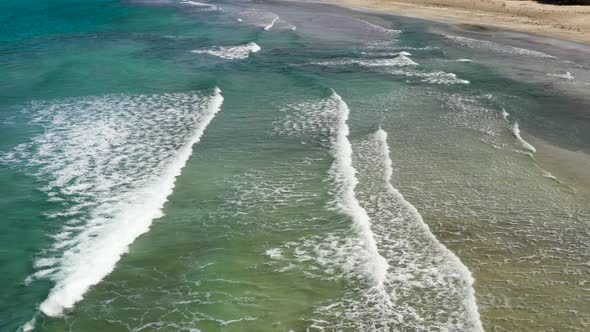 Aerial View To Tropical Sandy Beach and Blue Ocean.