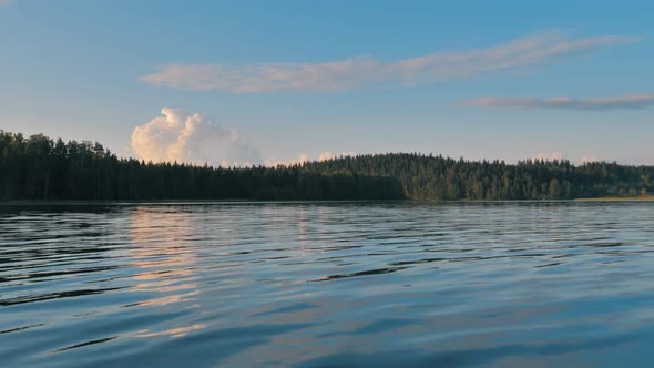 Rippling Surface of the Lake with Reflections on It