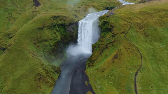 Skogafoss Waterfall on Skoga River on South Iceland in Summer Aerial Drone Footage From High