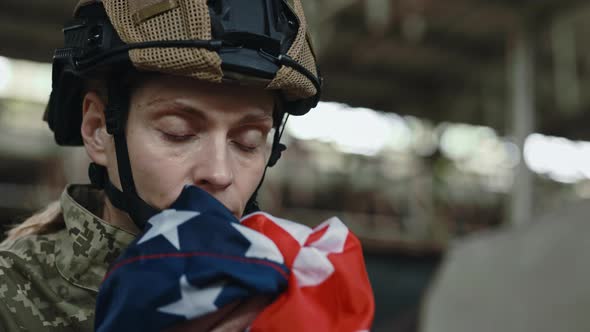 Female Soldier in Military Uniform Holding Usa Flag