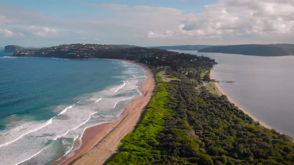 Palm Beach, Australia Beautiful, Narrow Beach Line, Ocean Waves Sand and Green Vegetation