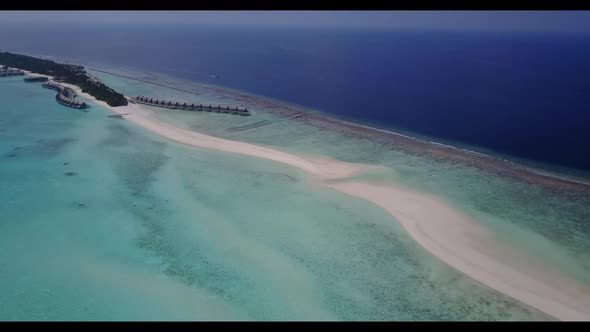 Aerial above scenery of paradise resort beach wildlife by transparent ocean and white sand backgroun