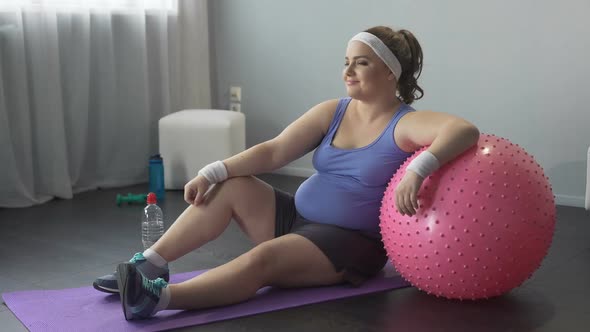 Full of Strength and Self-Confidence, Fat Girl Happy With Successful Workout