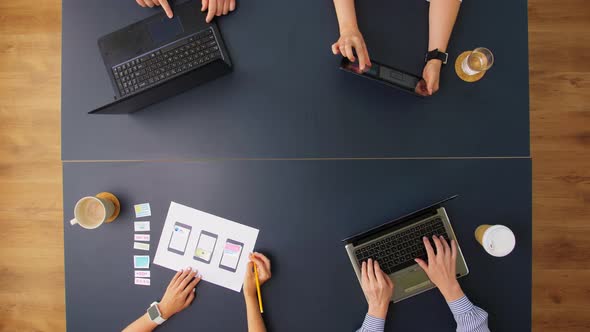 Business Team with Gadgets Working at Office Table