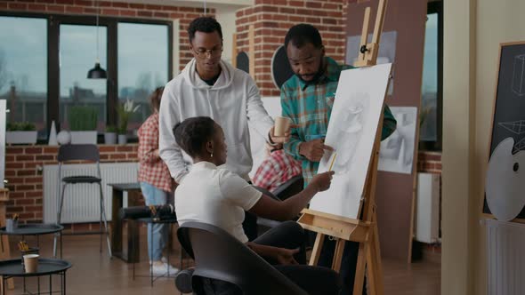 African American People Drawing Vase Sketch in Art Class