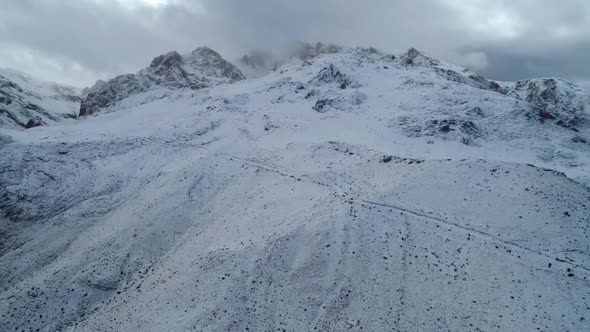 Snowy Mountains With Clouds