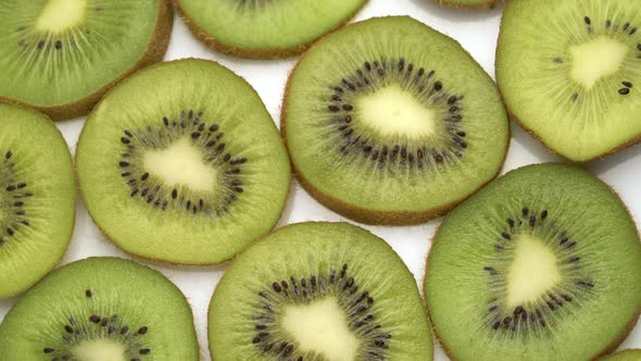 Kiwi Slices Closeup, Macro Food Summer Background, Fruits Top View. Rotate