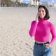 Young Woman Calls on the Phone and Walks Along the Sea - VideoHive Item for Sale