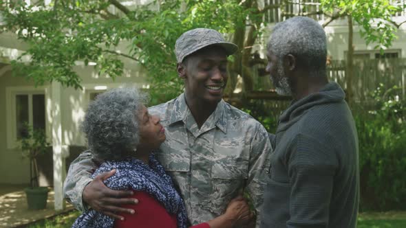 Soldier with his parents alt