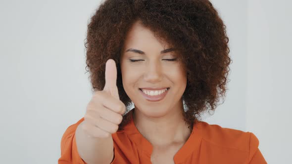 Portrait of Curly Hair African American Woman Positive Biracial Model Girl Posing Indoor Looking at