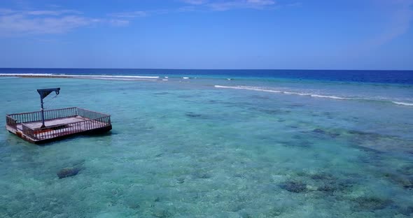 Luxury above island view of a white paradise beach and blue sea background in best quality 4K