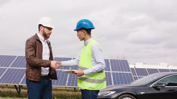 One Young Ecological Worker Man and Industrial