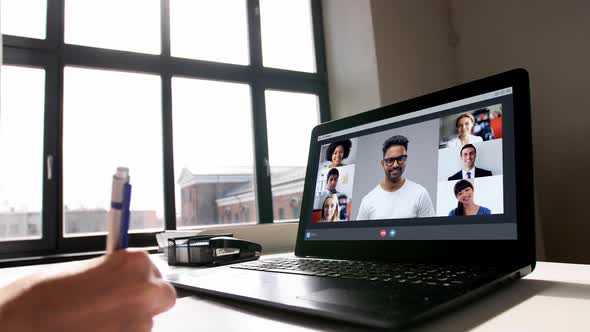 Woman with Laptop Having Video Call at Office