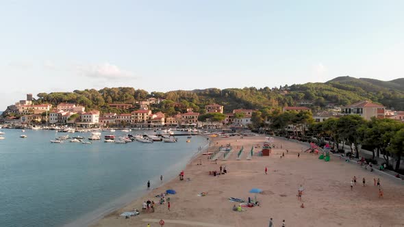 Aerial View of Marina Di Campo Coastline at Sunset Elba Island  Italy