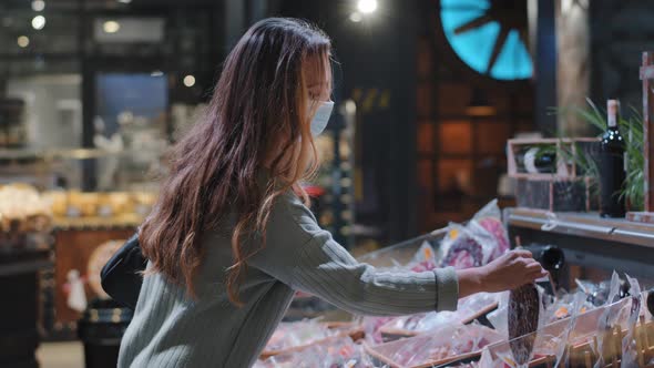 Caucasian Woman Consumer Buyer Female Girl in Medical Mask Shopper in Supermarket Grocery Store