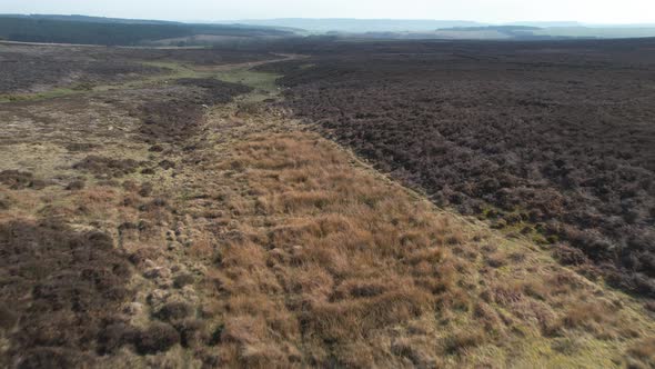 Aerial view above Goathland North Yorkshire moors peaceful rural countryside terrain