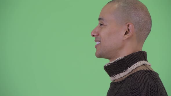 Closeup Profile View of Happy Bald Multi Ethnic Man Talking Ready for Winter