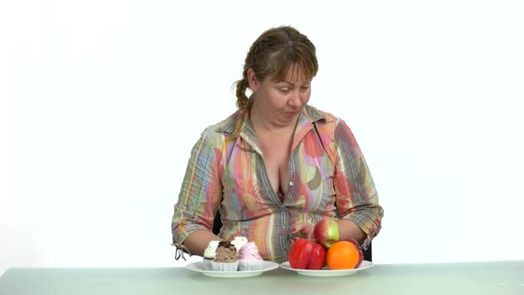 Surprised Woman Choosing Between Healthy and Unhealthy Food