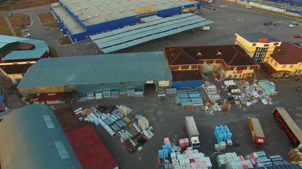 Building materials warehouse. Aerial view of large industrial logistic warehouse storage