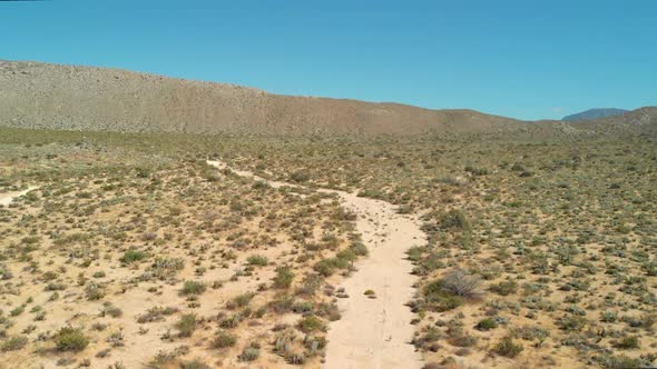 Aerial Dolly Forward of Desert Landscape