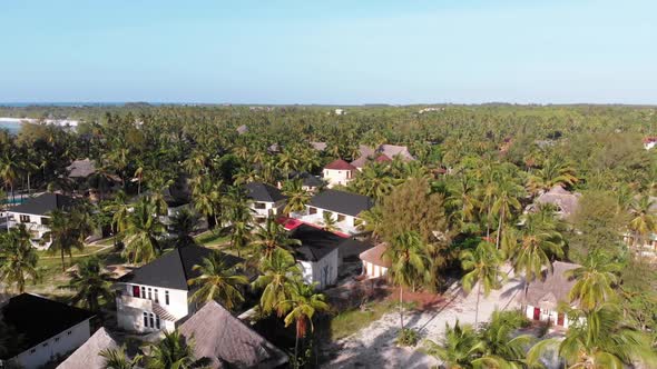 Paradise Coast Resort with Palm Trees and Hotels By Ocean Zanzibar Aerial View