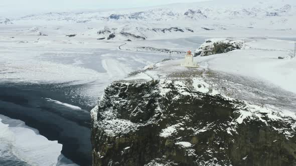 Aerial View of Iconic Black Sand Beach Around Reynisfjara Beach and Dyrholaey Lighthouse