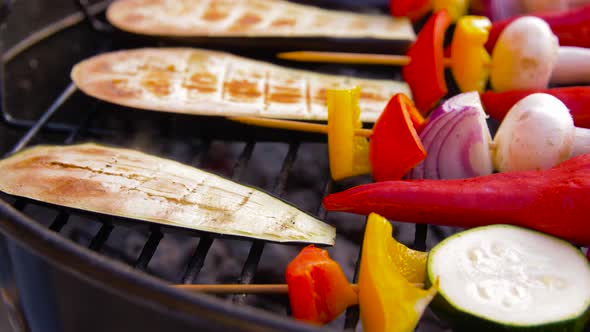 Vegetables and Mushrooms Roasting on Brazier Grill