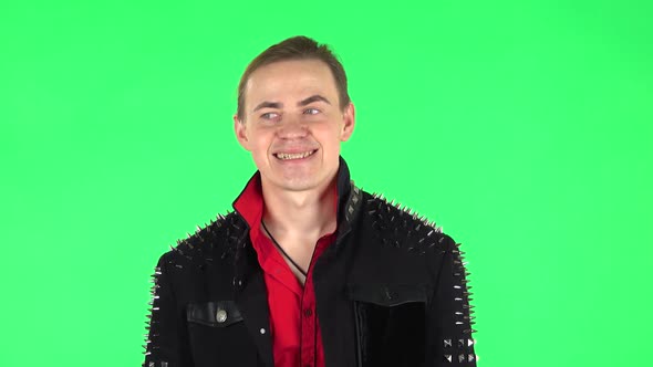 Guy Disappointed Looking in Camera and Shrugs. Green Screen