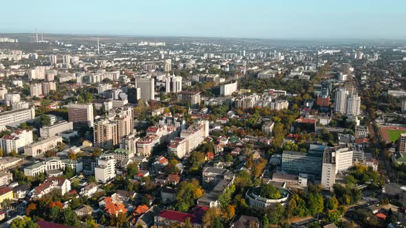 Aerial drone view of Chisinau downtown at sunset. Panorama view of multiple buildings