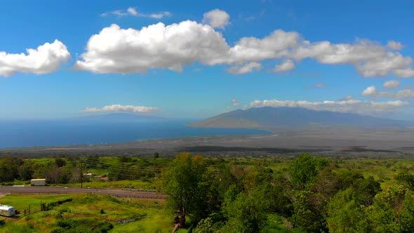 Beautiful 4k drone Maui upcountry near Keokea looking towards Maalaea Bay. February sky.