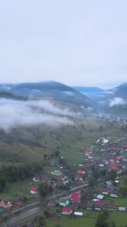 Vertical Video Village in the Carpathian Mountains in Autumn