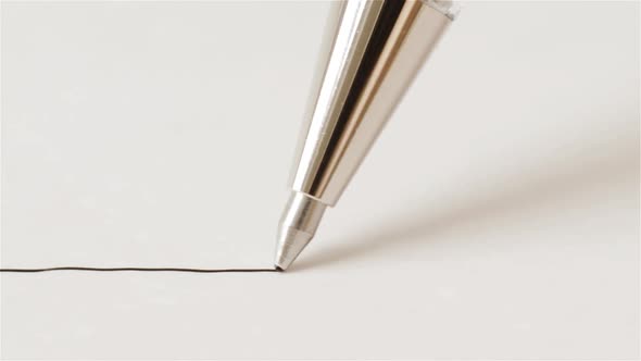 Pen Writes Line On Paper