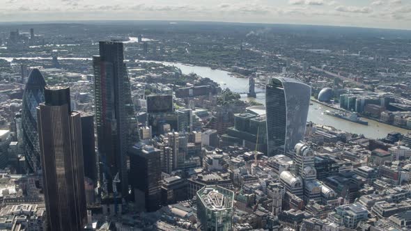 london city aerial helicopter flight urban skyline financial banking