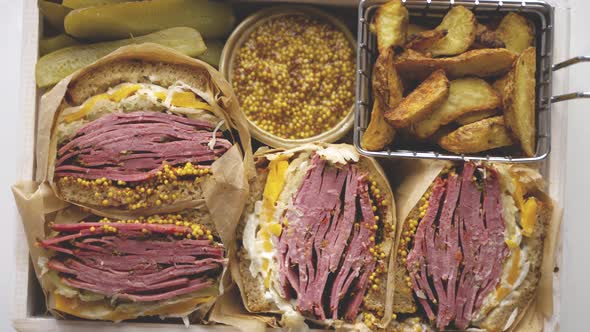 Enormous Sandwiches with Pastrami Beef in Wooden Box