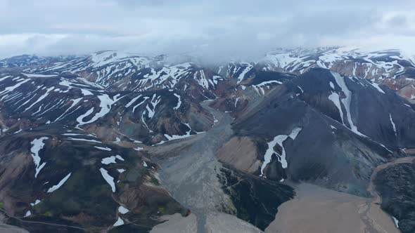 Birds Eye View of Krossa River with Black Volcanic Ashes Flowing in Thorsmork Canyon Valley