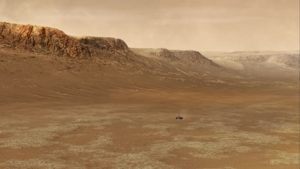 A research rover travels on Mars during a dust storm