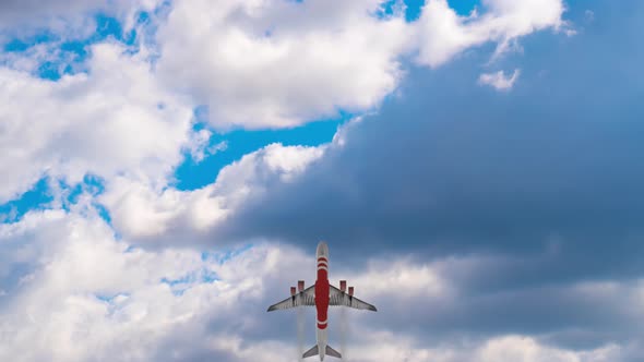 Passenger Airplane Flies Across Picturesque Sky with Clouds