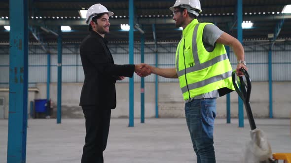 Successful Work Partner Handshake Showing Project Success