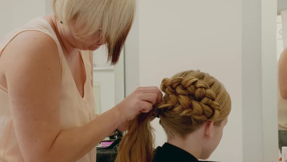 Hairdresser Young Gril Making Cornrows